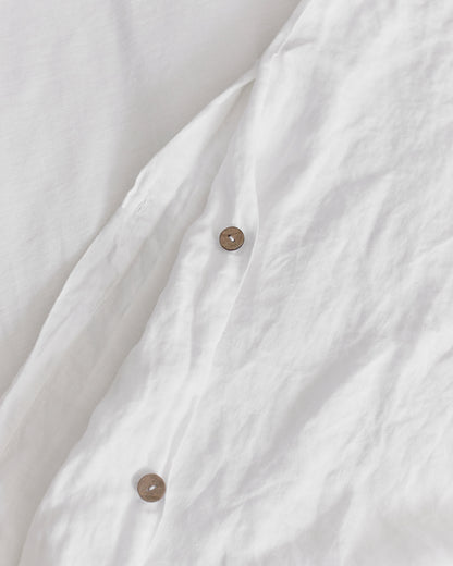 coconut button enclosure of white hemp duvet cover